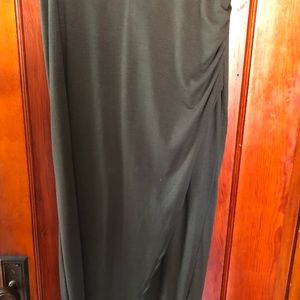 High waisted olive green skirt with thigh slit.